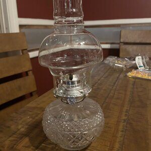 Antique  oil lamp   base has  geometric design   chimney  clear glass  12in tall